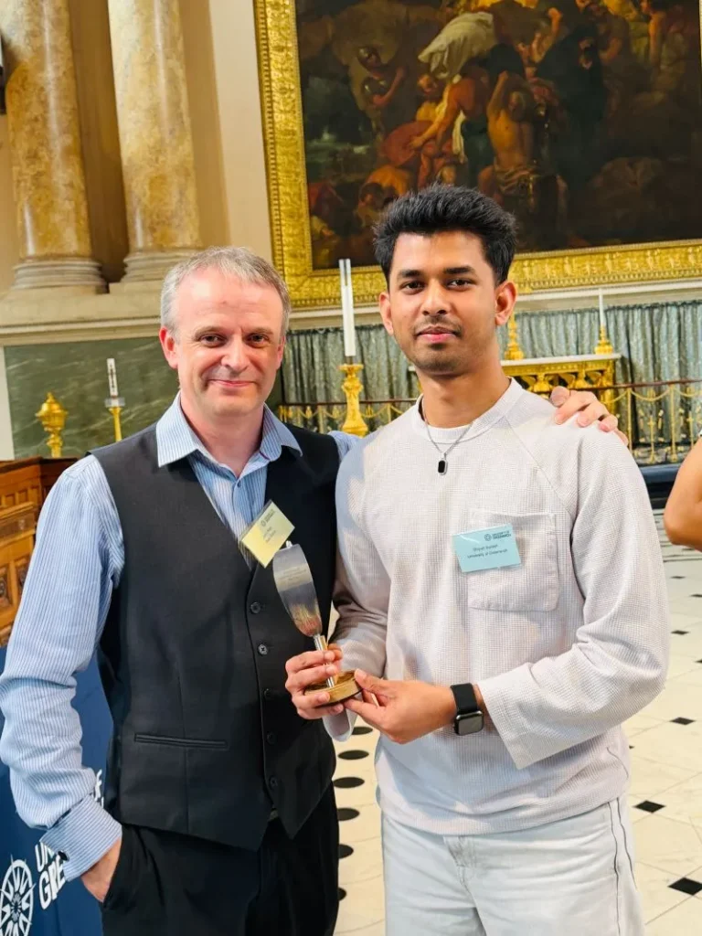 An image of John and Shiyon at the award ceremony